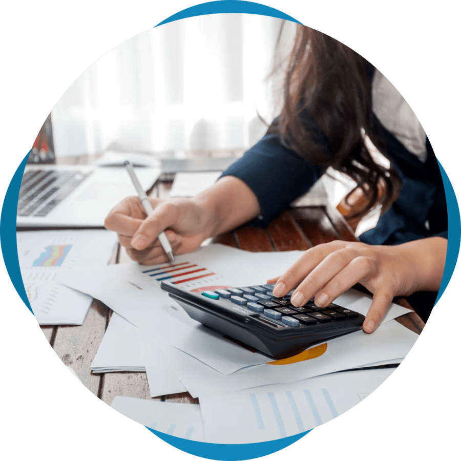 Woman working on financial documents.