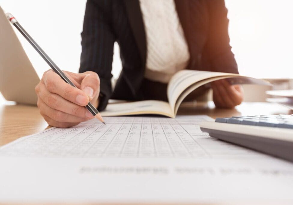 Businesswoman reviewing financial data.